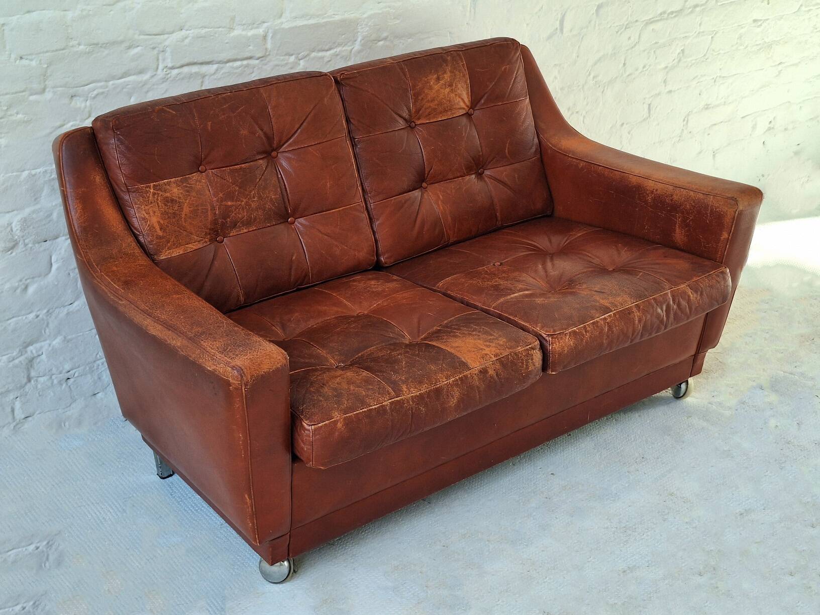 Mid century patchwork tufted patinated leather sofa, 1960s