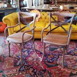 Angled wooden armchairs