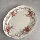 Bishop & Stonier “Wentworth” polychrome iron earthenware dish