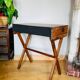 Desk, writing desk in solid rosewood and studded leather, 20th century.
