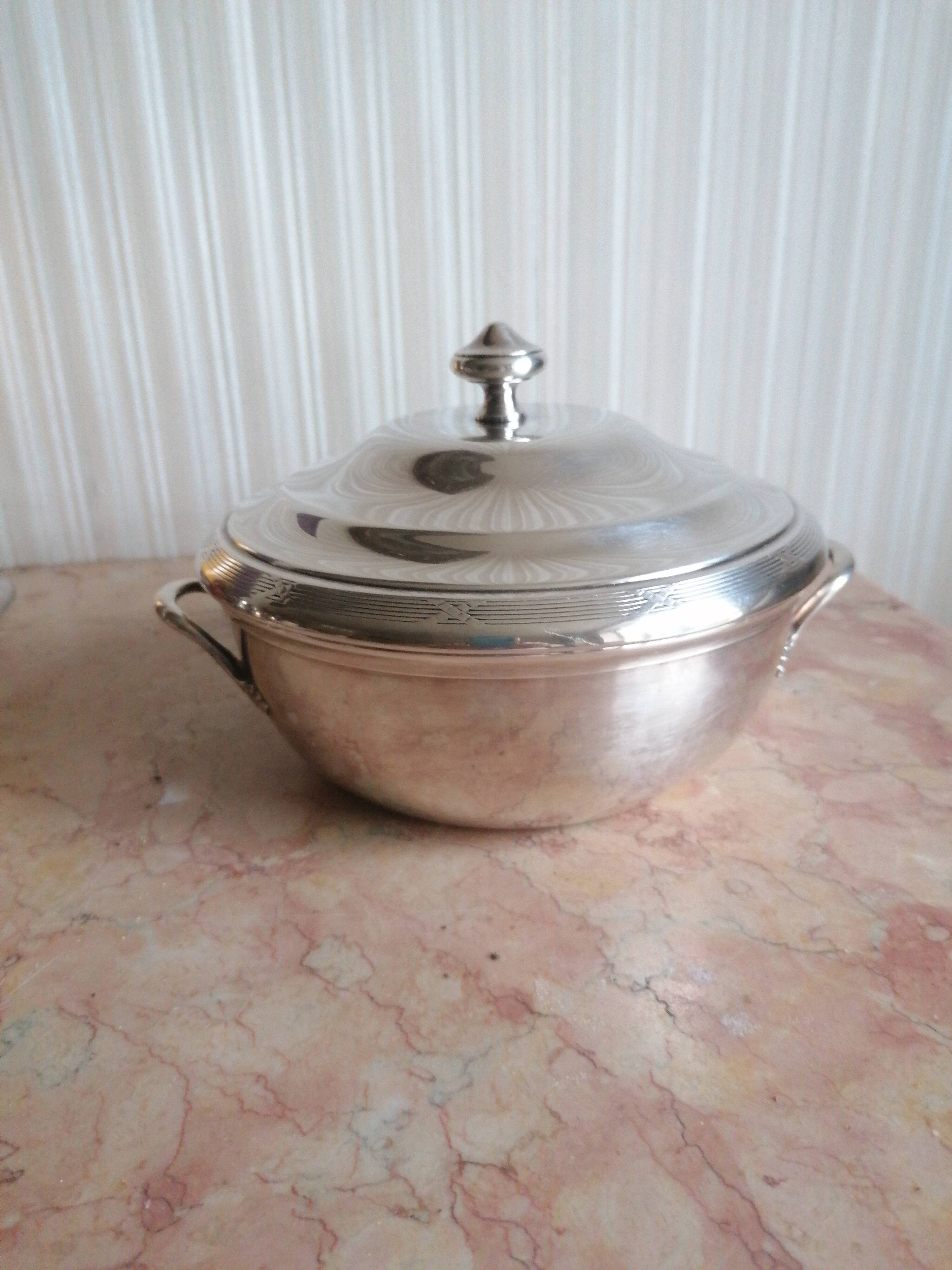 silver metal vegetable dish with crossed ribbon decoration