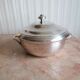 silver metal vegetable dish with crossed ribbon decoration