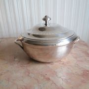 silver metal vegetable dish with crossed ribbon decoration