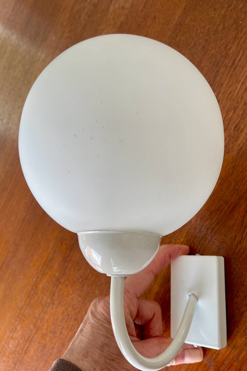 White metal wall light and opaline ball