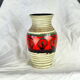 Frieze vase with green and red round