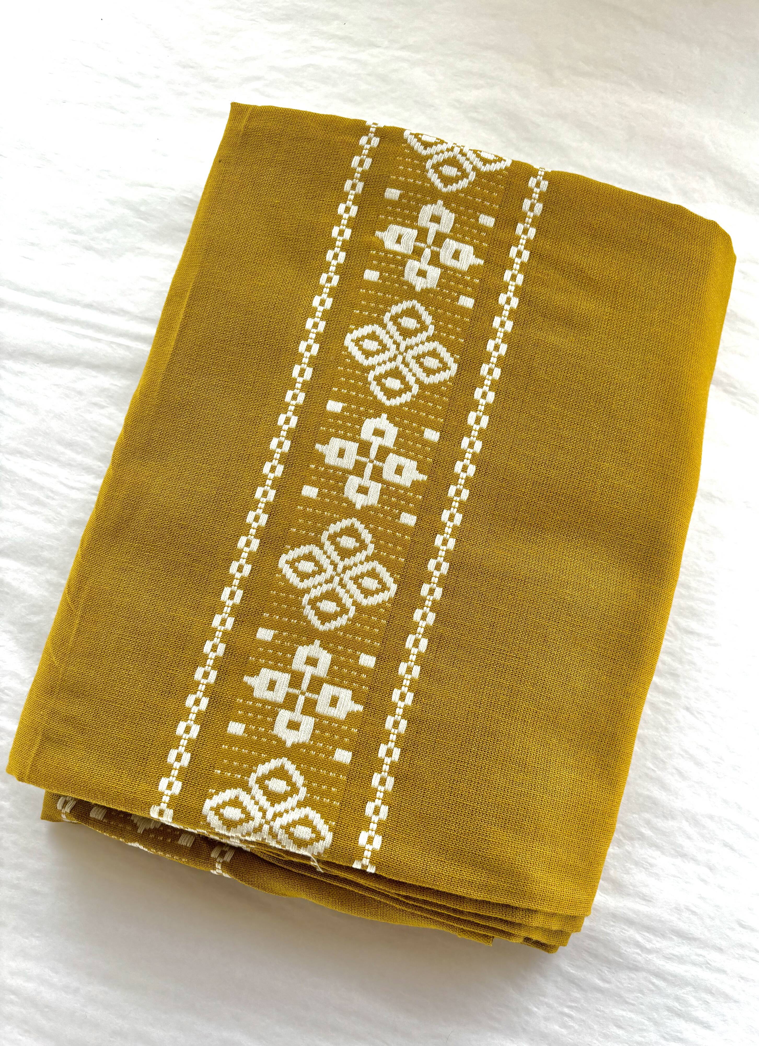 Basque pattern tablecloth, mustard