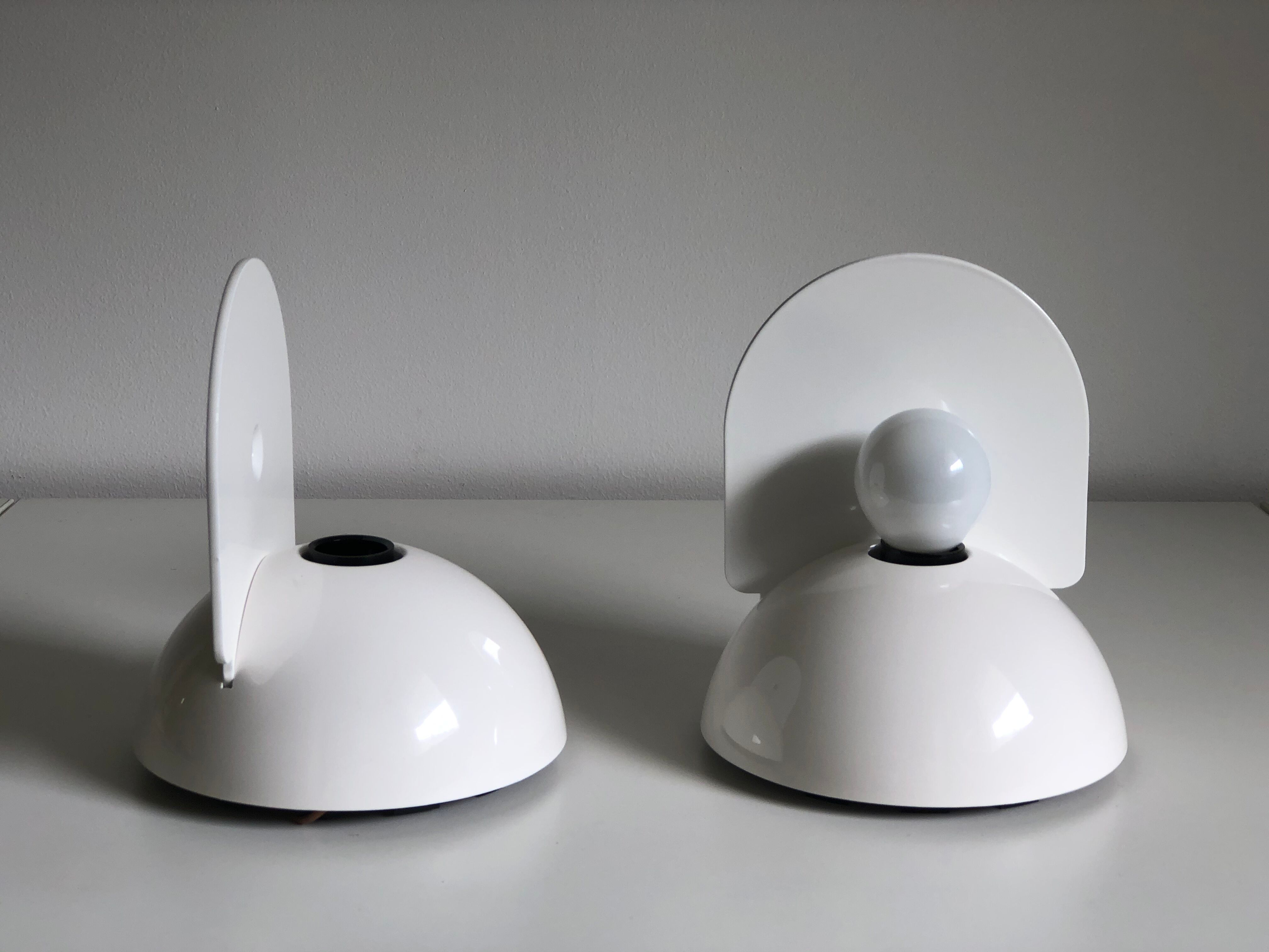 White Buco applior by Claudio Dini edited by Artemide, 1974