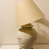 1980s ceramic table lamp with a wooden base and adjustable shade.