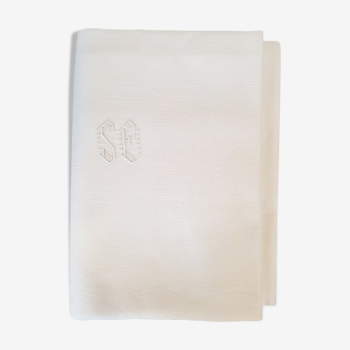 Old rectangular white tablecloth damask and monogrammed