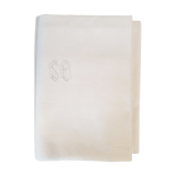Old rectangular white tablecloth damask and monogrammed