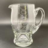 Patterned pitcher in worked glass