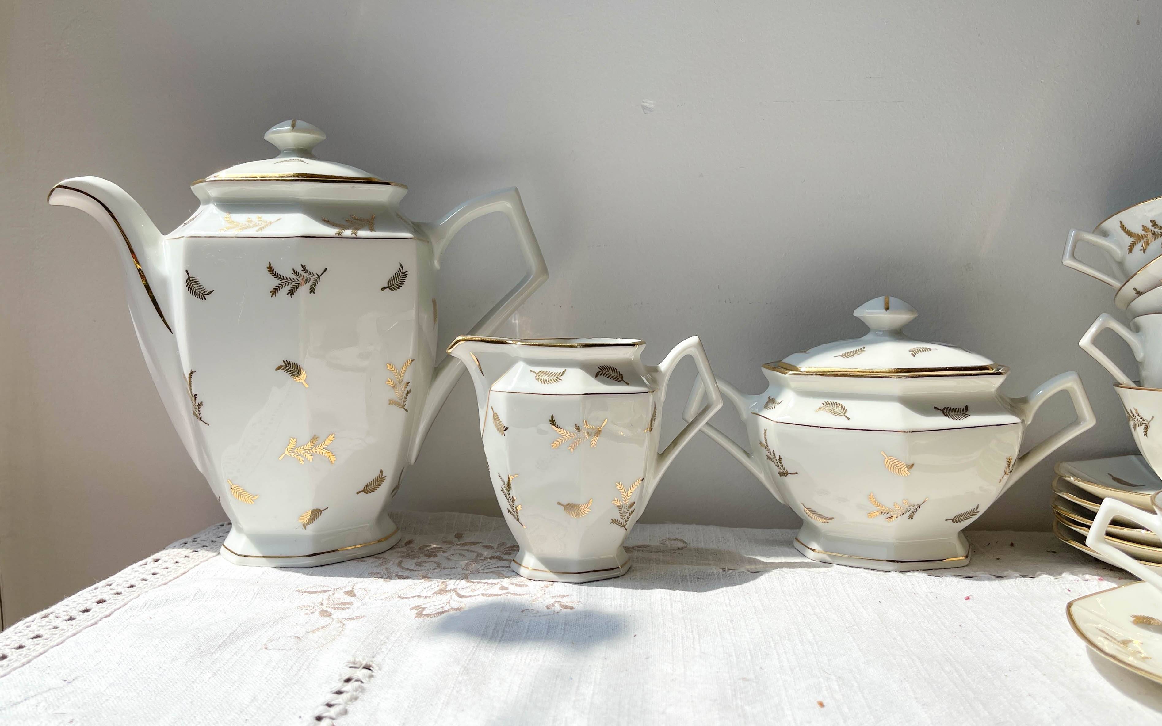 Vintage tea/coffee set in white porcelain with Limoges gold trim