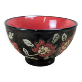 Small vintage black and red bowl with floral decoration.
