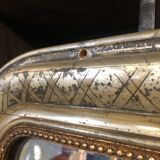 Gilded Louis Philippe mirror with decoration 120x77