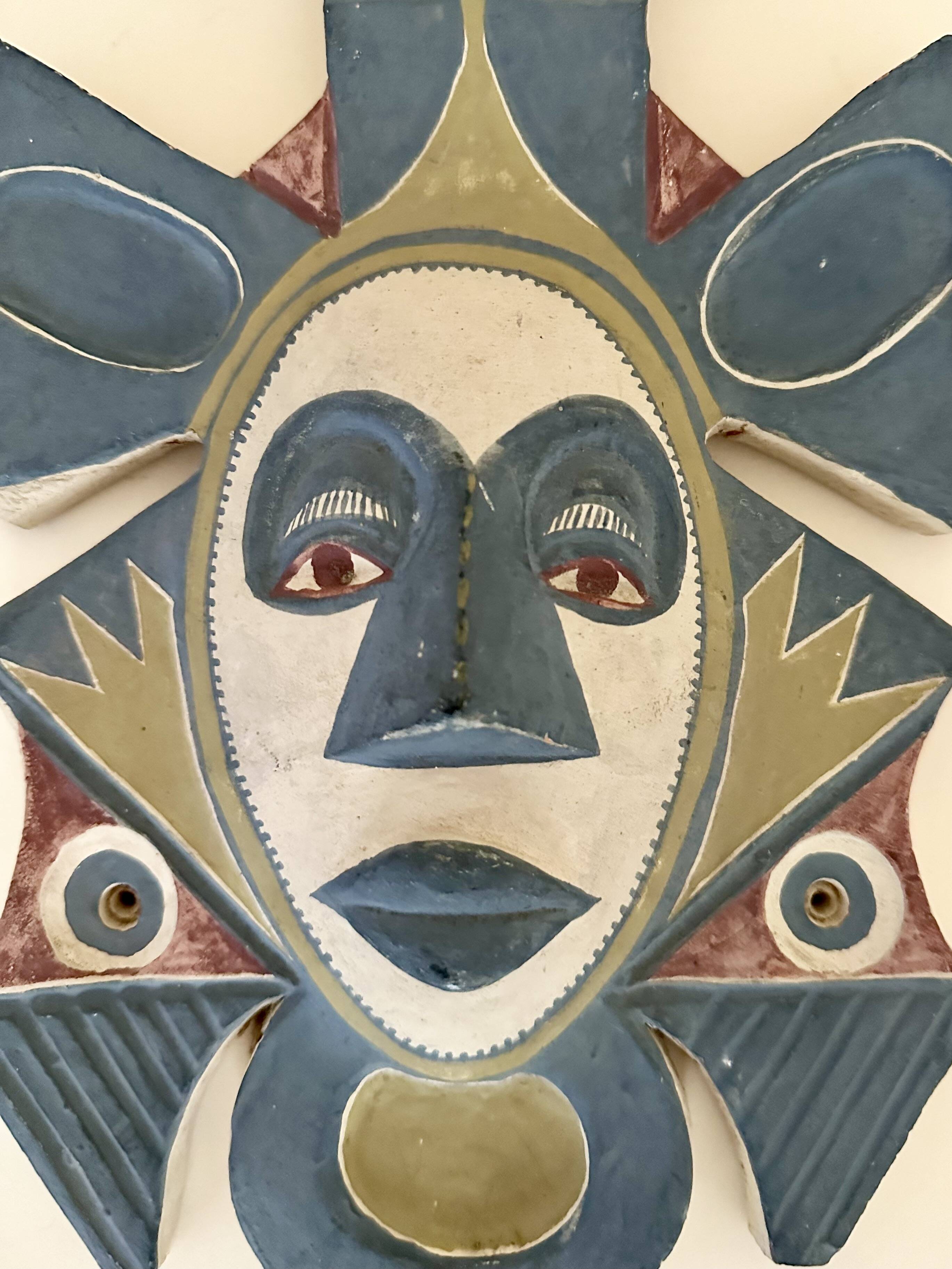 Painted terracotta wall mask