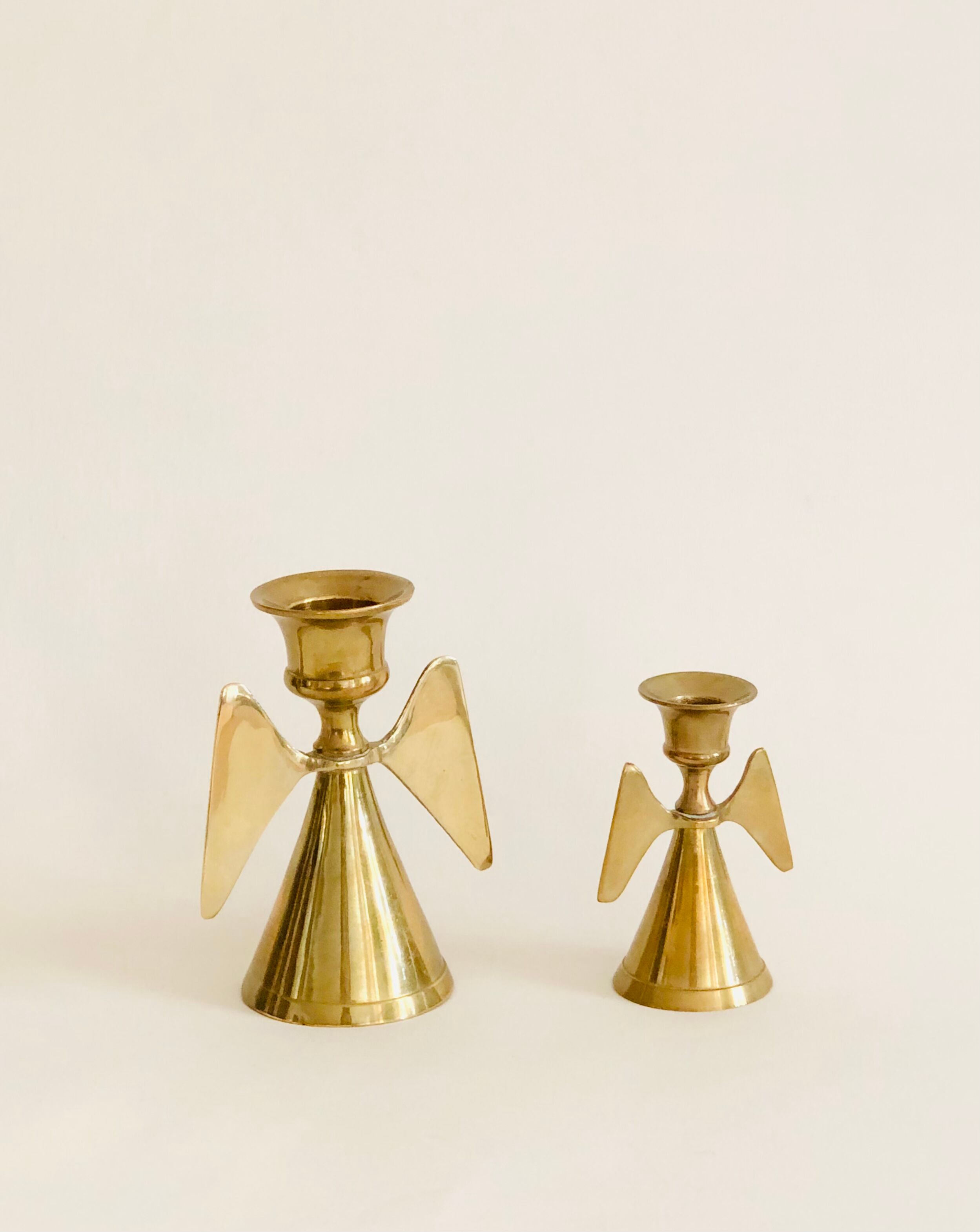 Duo of brass angel candle holders