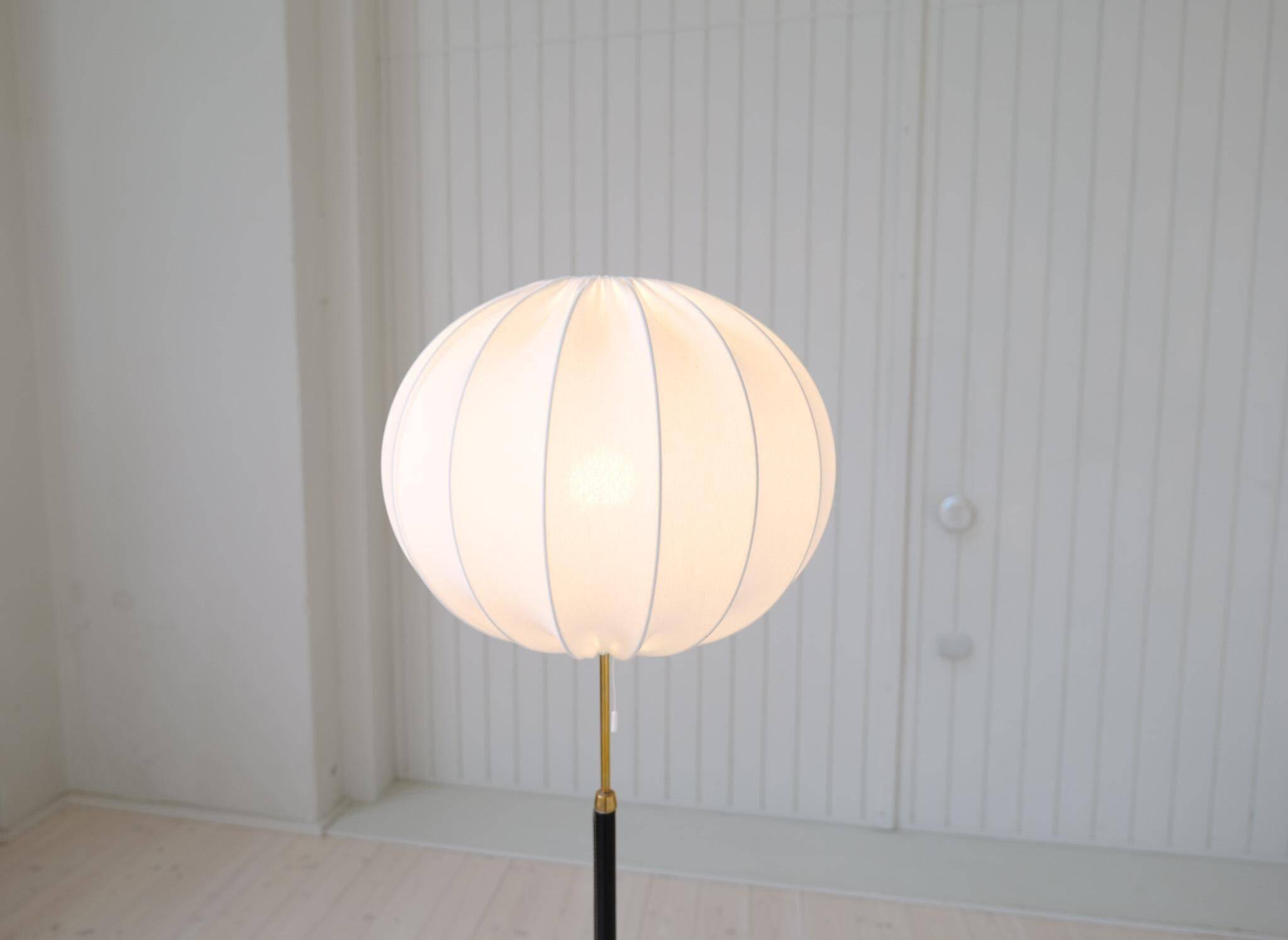 Mid-century black leather floor lamp by Falkenbergs Belysning, Sweden, 1960s.