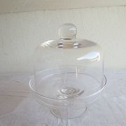 Old glass cake dome on a stand