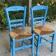 2 solid wood chairs in blue straw