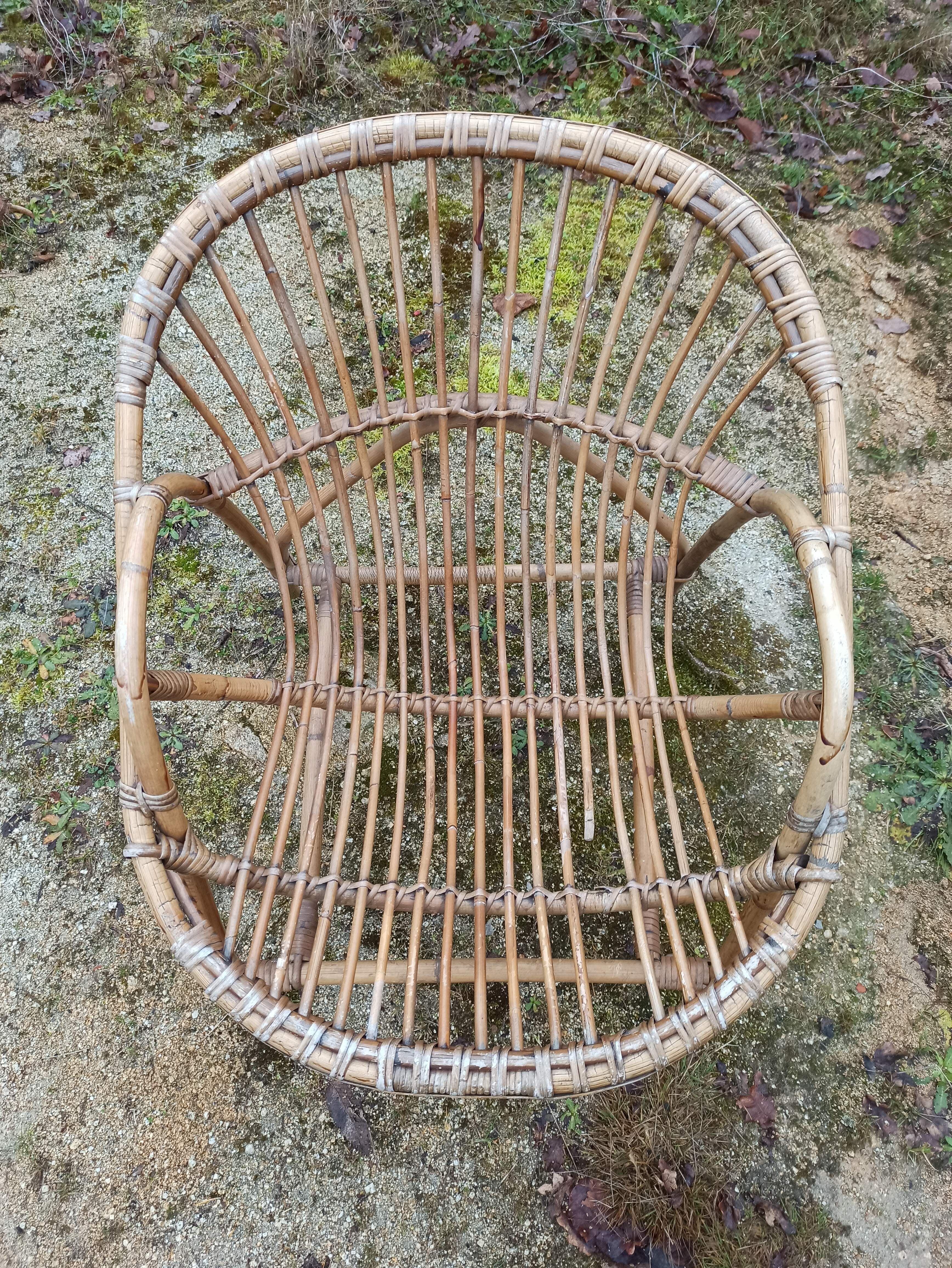 Rattan armchair with armrest