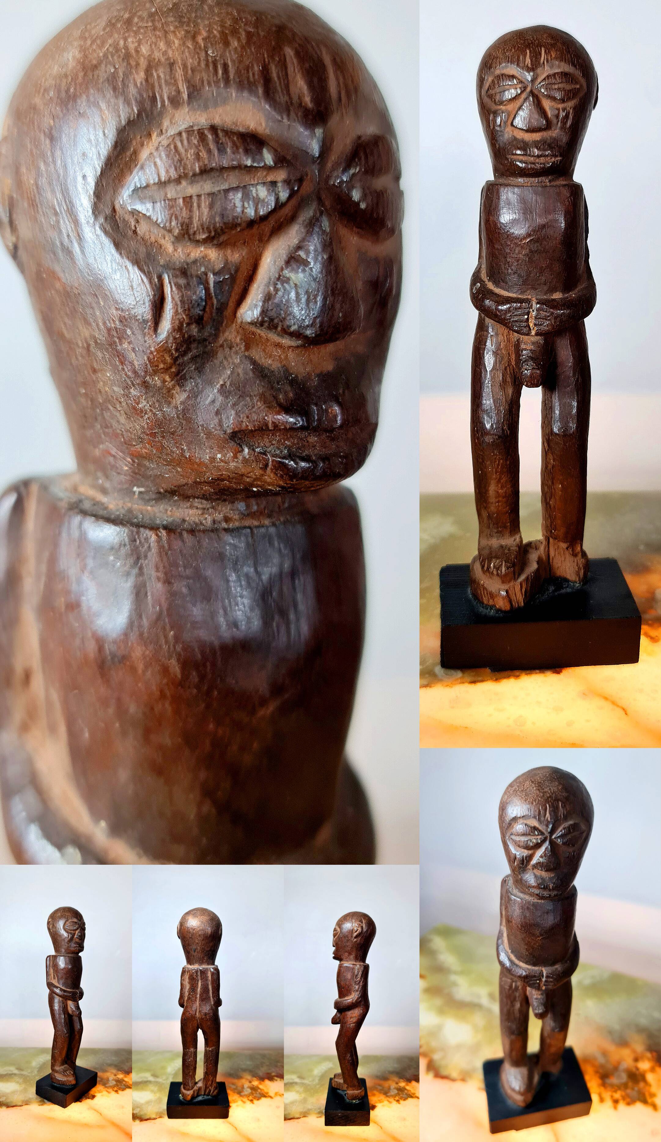 Old Fon statuette on a base, Benin