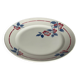 Round plate from the Céranord Saint-Amand service • Red and blue floral decoration
