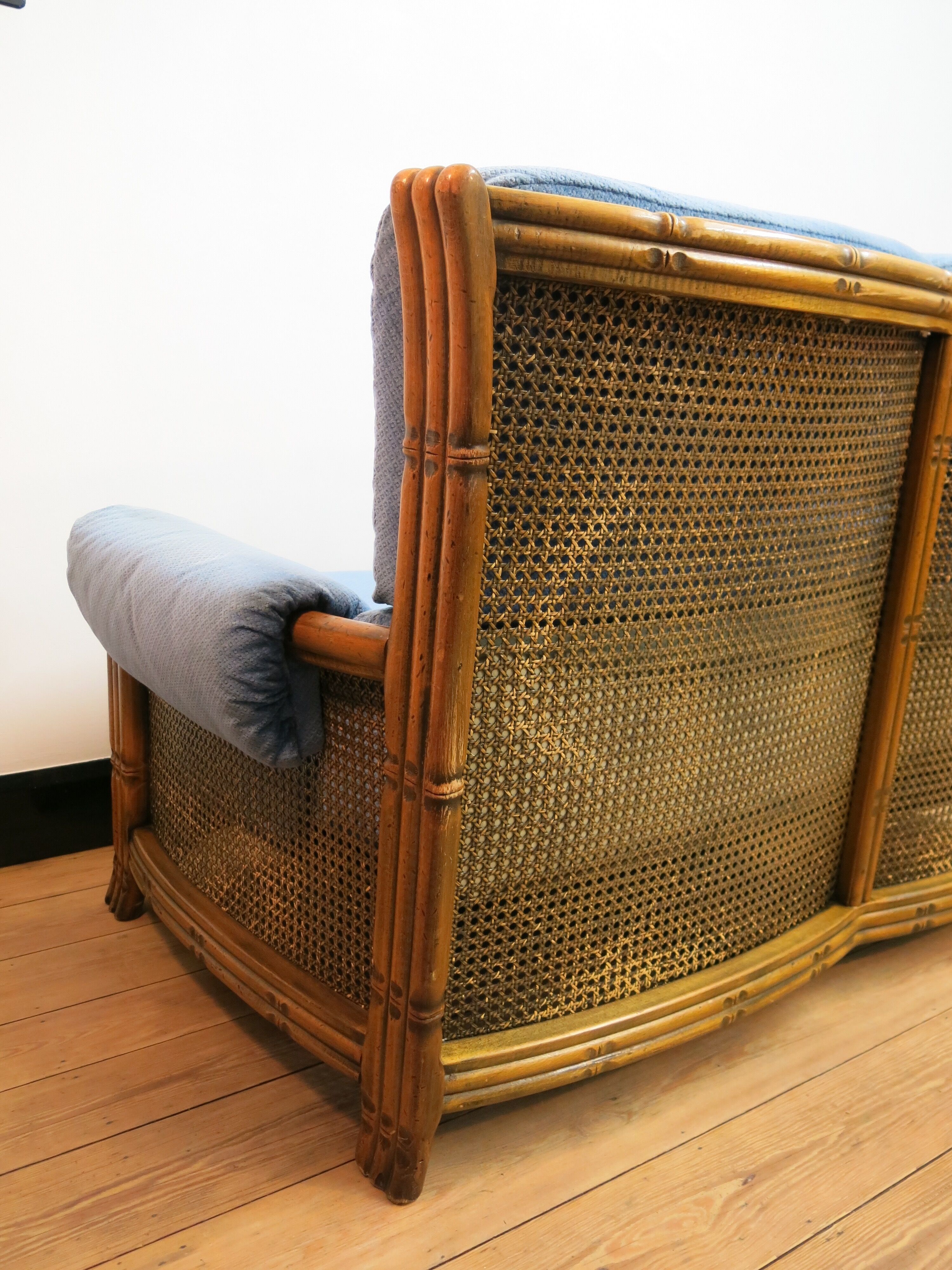 Colonial sofa two places in cannage and carved wood