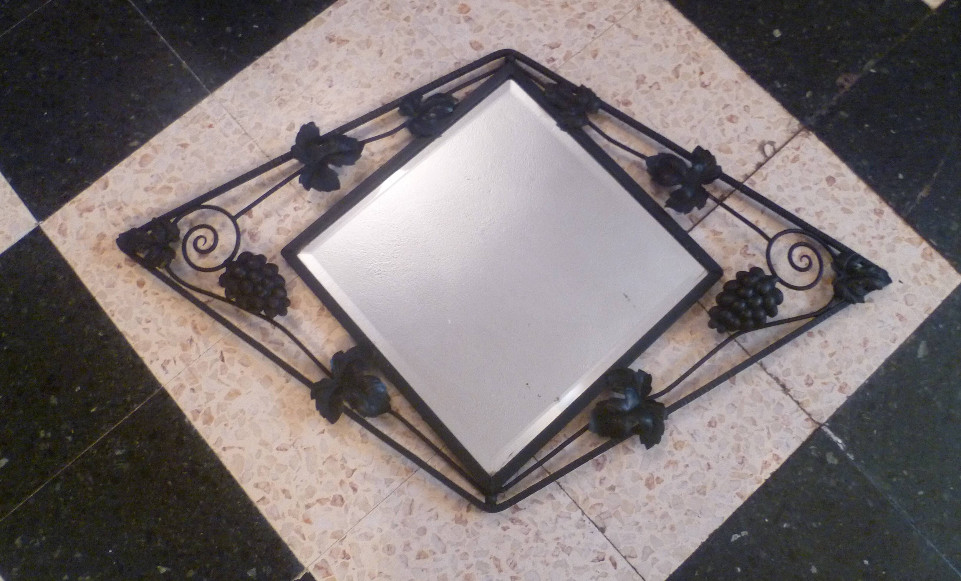 Art deco beveled mirror in wrought iron with grape decor