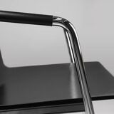 Mid-century modern black design chair in with armrests, Belgium