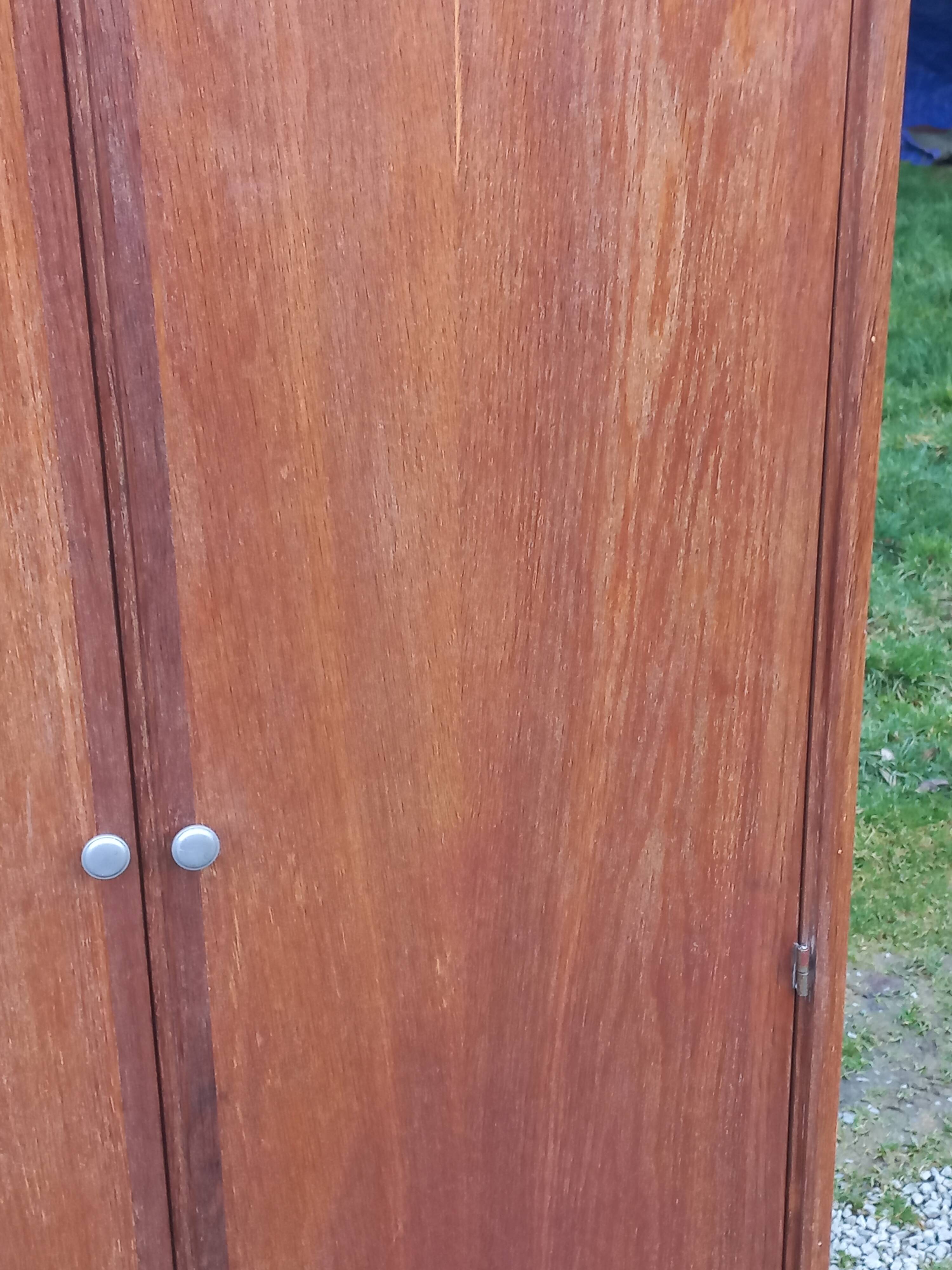 Vintage oak wardrobe with metal legs from the 1950s.