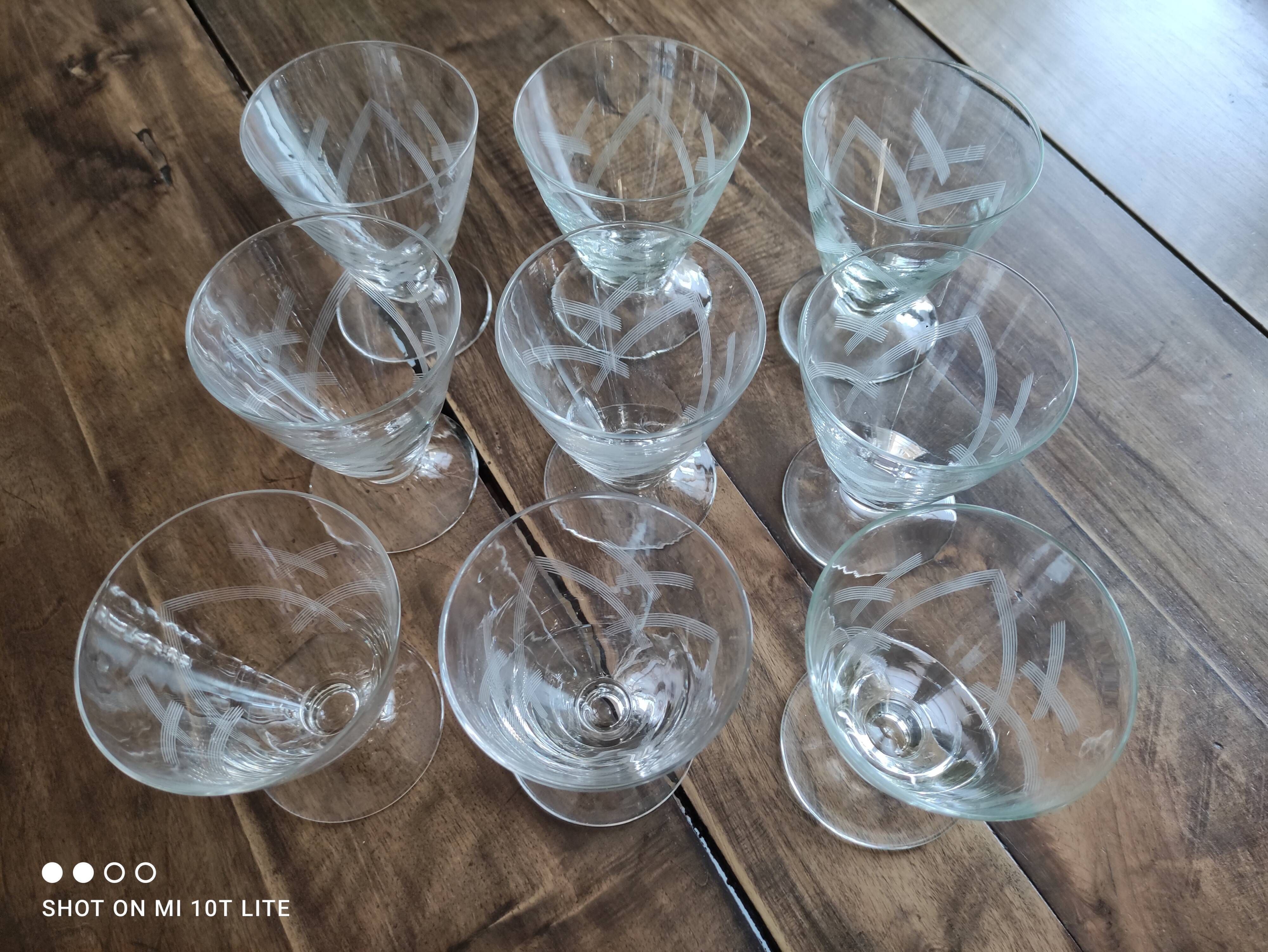 Set of 9 conical glasses on pedestal in antique chiseled glass crosses