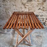 Vintage folding garden table in pine, mid-20th century.