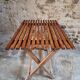 Vintage folding garden table in pine, mid-20th century.