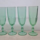 Set of 4 green Luminarc flutes