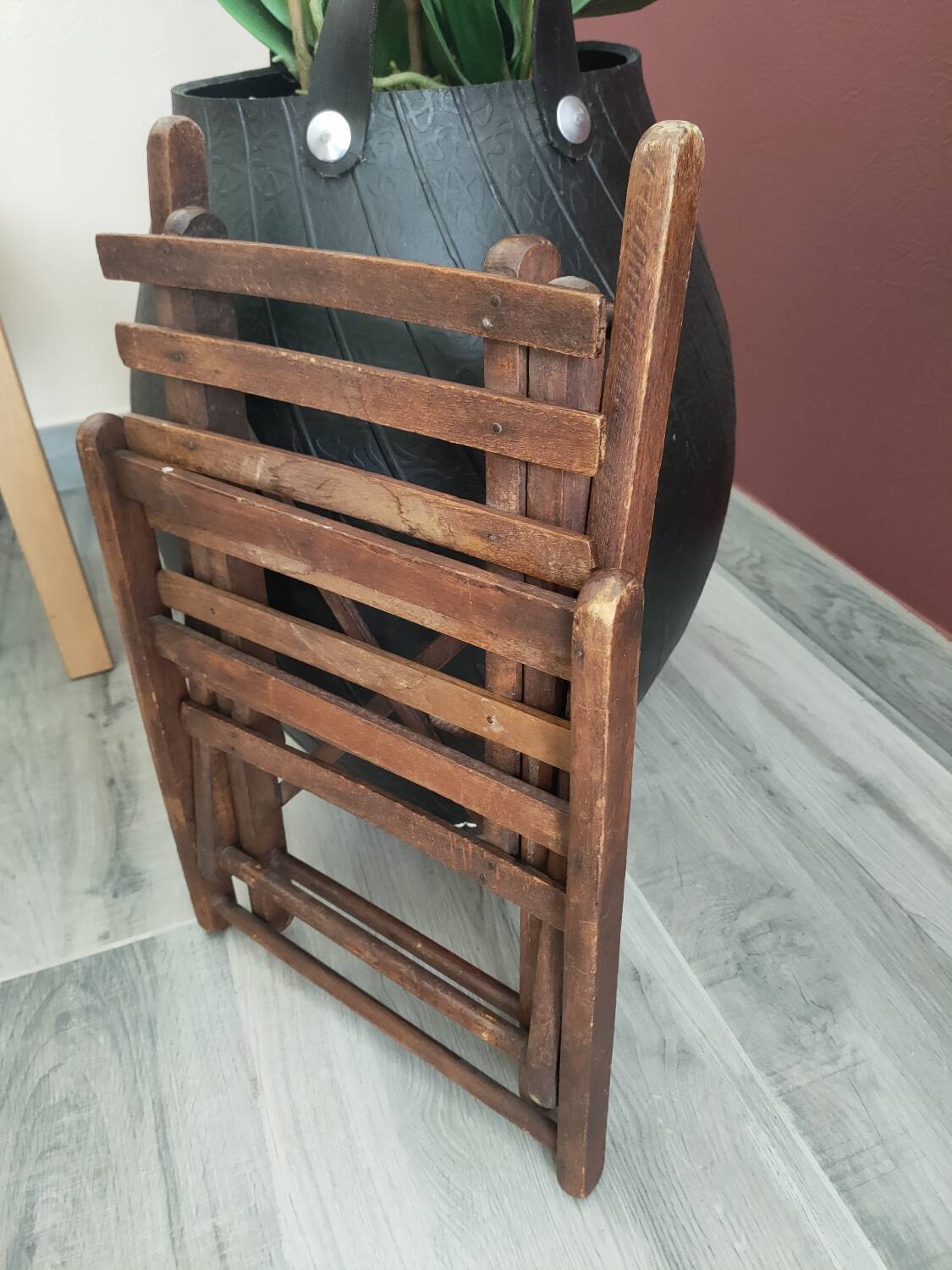 Small folding wooden chair
