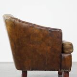 Stylish armchair with a unique design and beautiful finish, made of leather