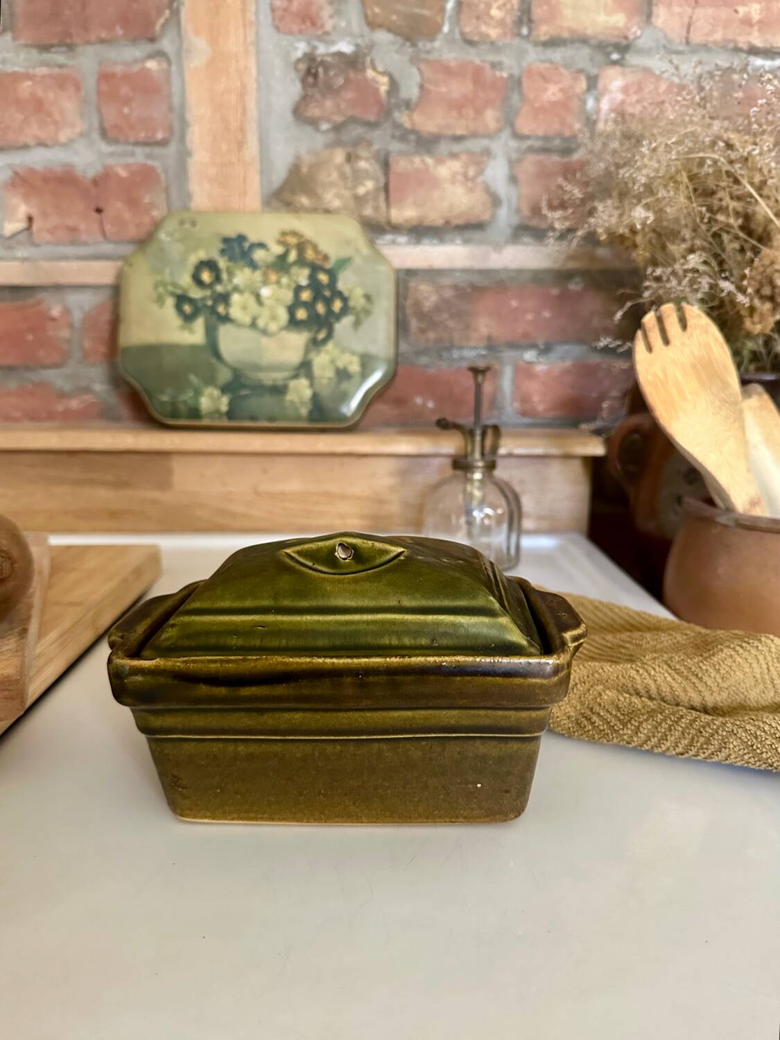 Vintage green majolica butter dish