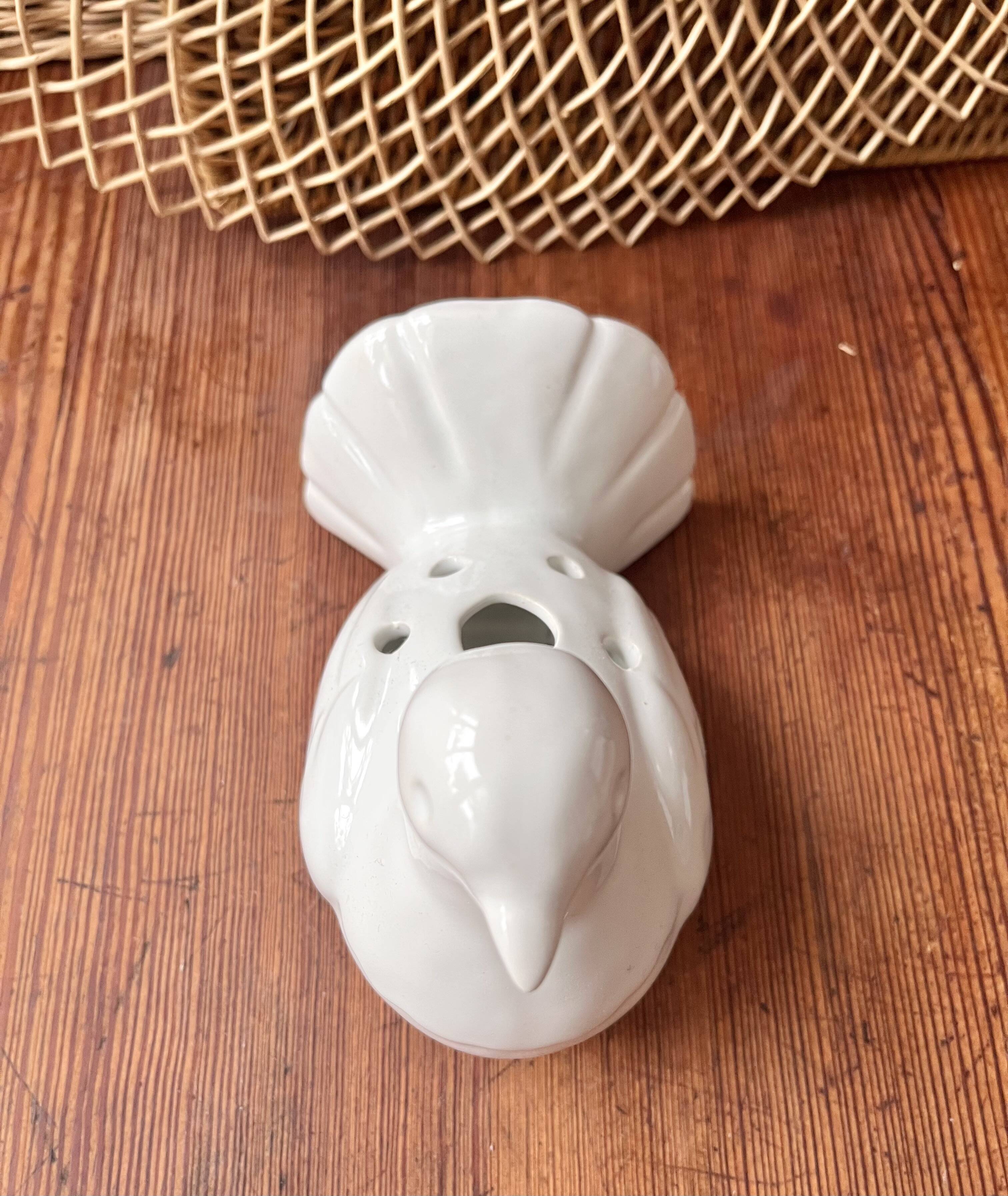 Ceramic vase bird flower spike