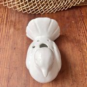 Ceramic vase bird flower spike