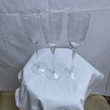 Set of 3 engraved champagne flutes.