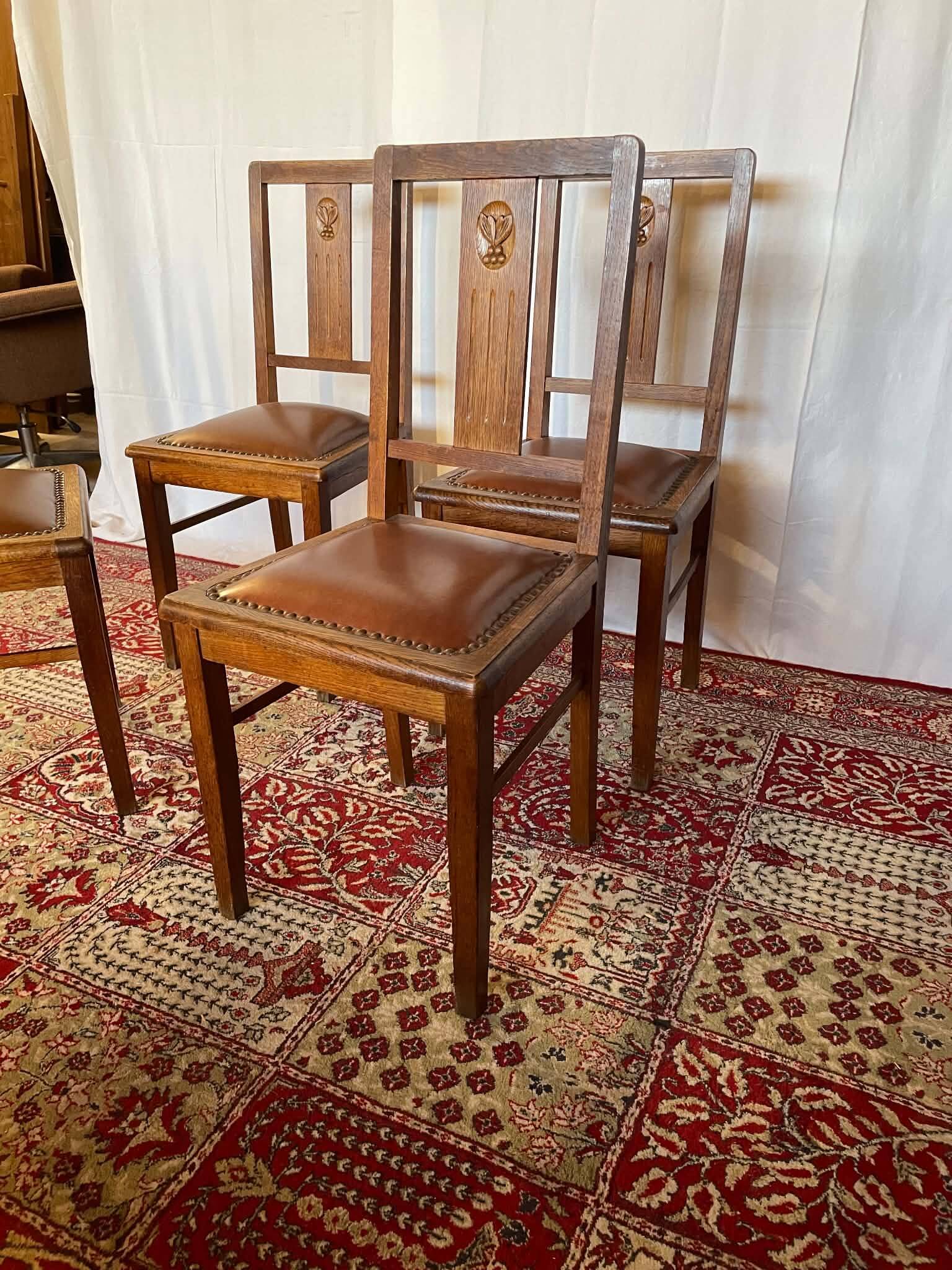 Set of 4 Art Deco chairs in oak and brown leather.
