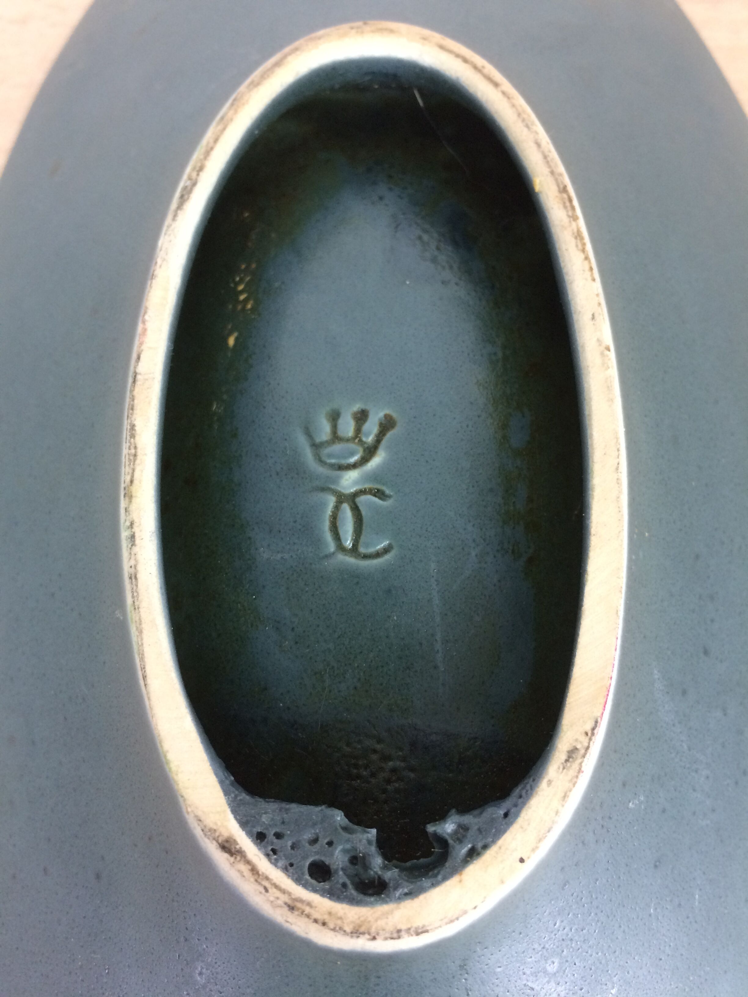 Empty vintage blue ceramic pocket