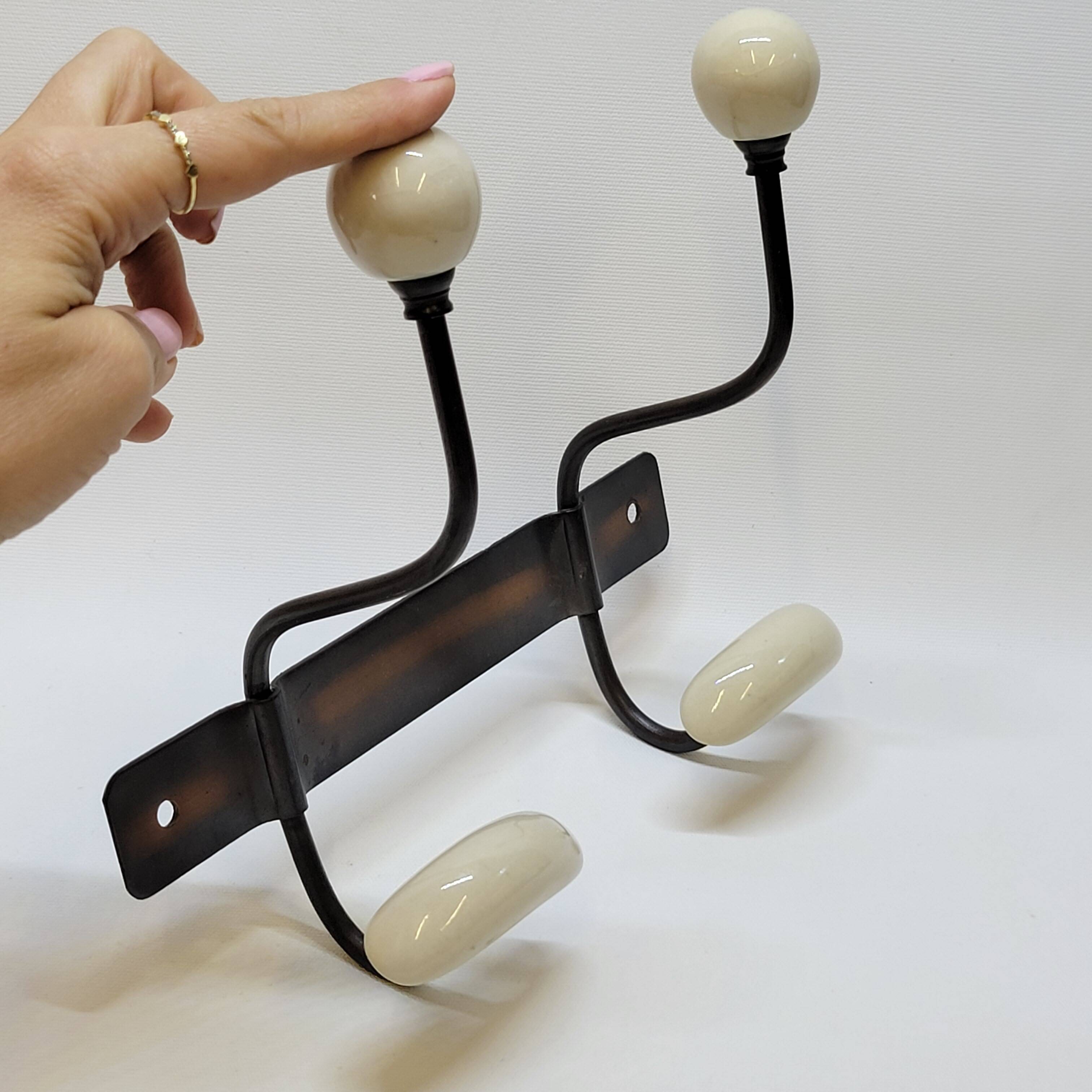 Wall coat rack in metal and porcelain with 2 hooks