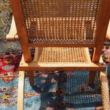 Cane folding armchair in solid wood