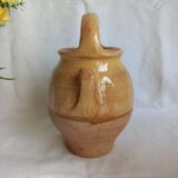 Jug, small terracotta pitcher with yellow glaze