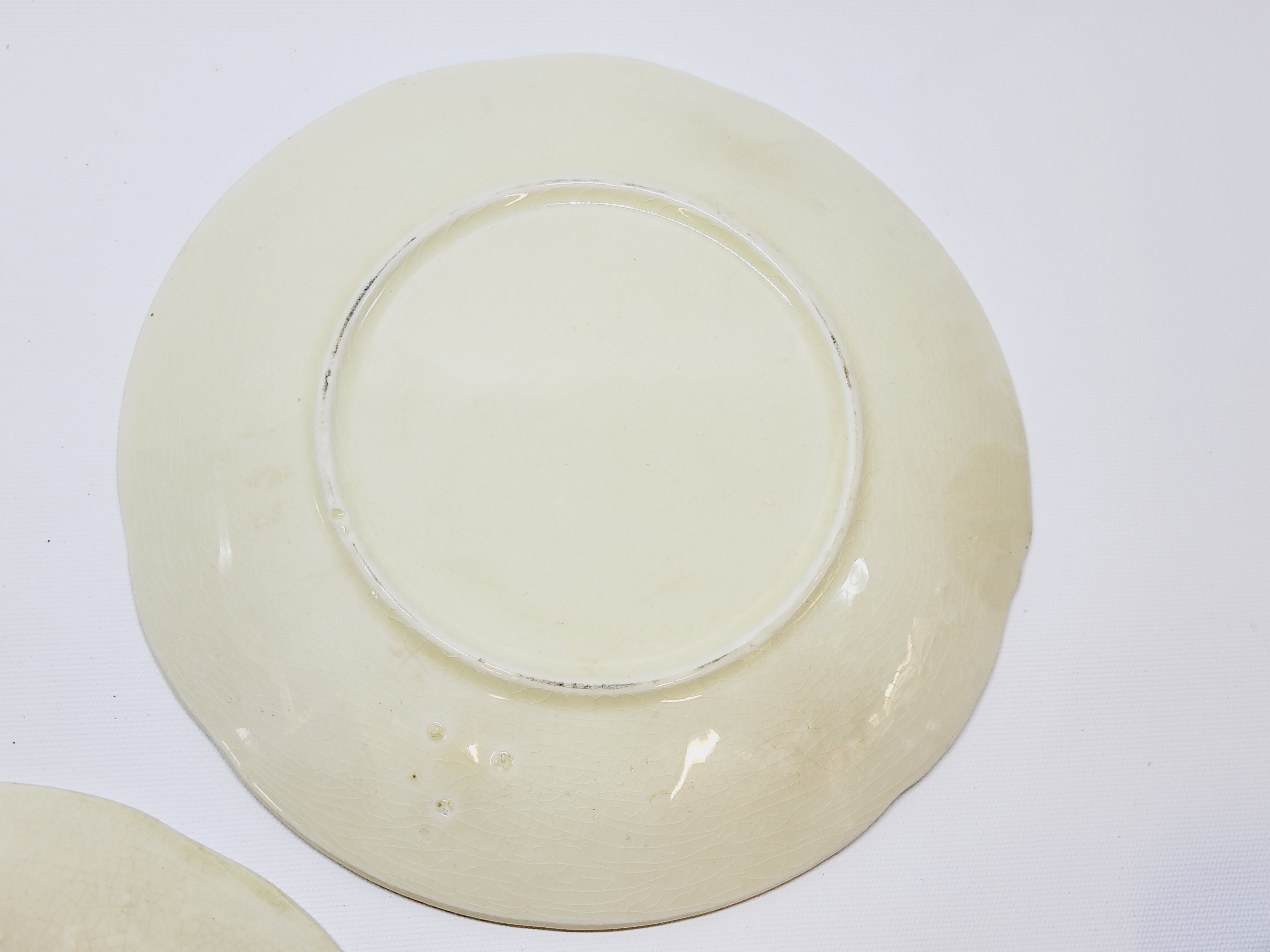 3 old plates in slip decoration strawberries and grapes