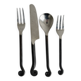 Set of 4 hammered metal cutlery with snail pattern.