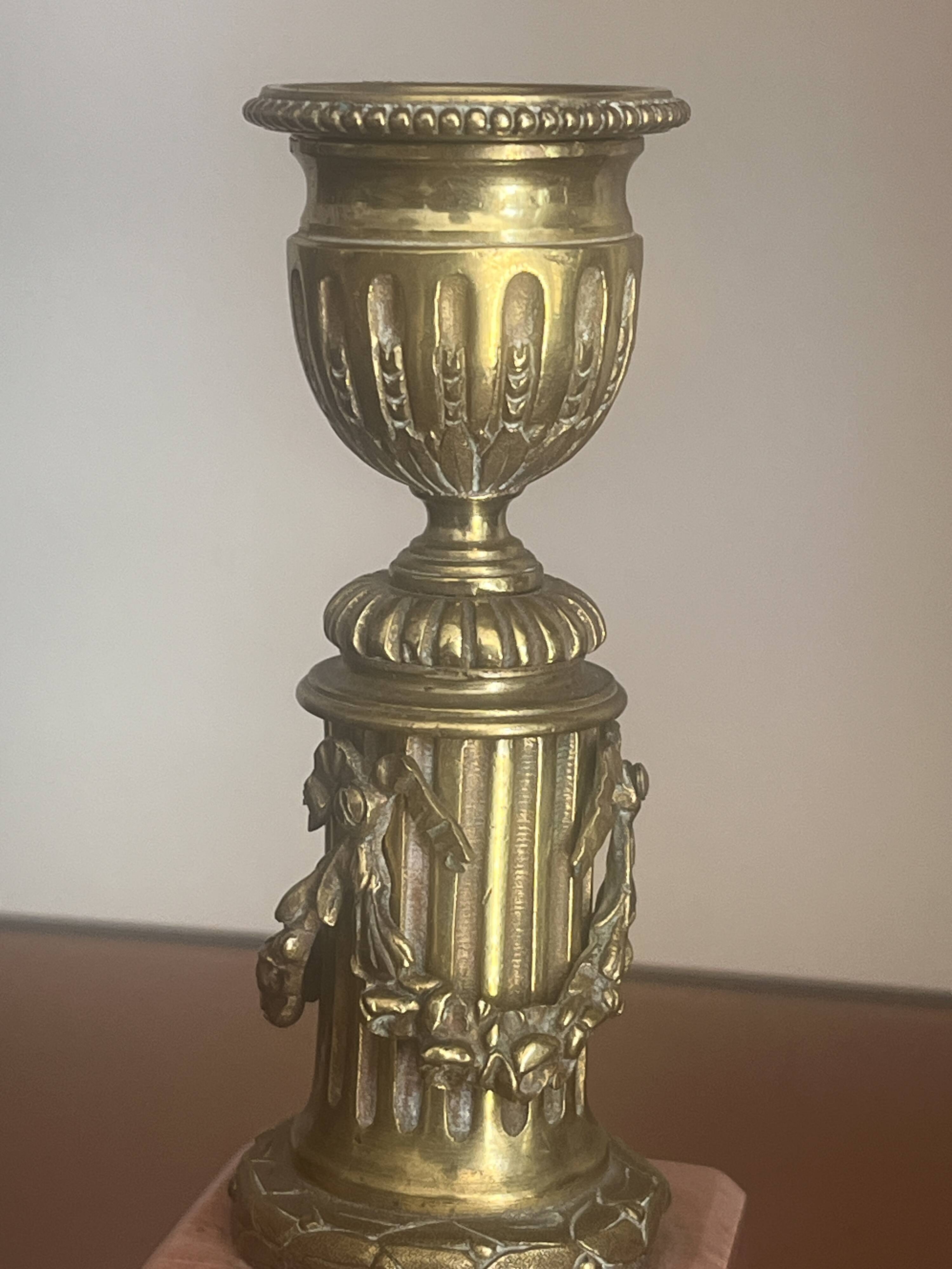 pair of antique bronze candlesticks