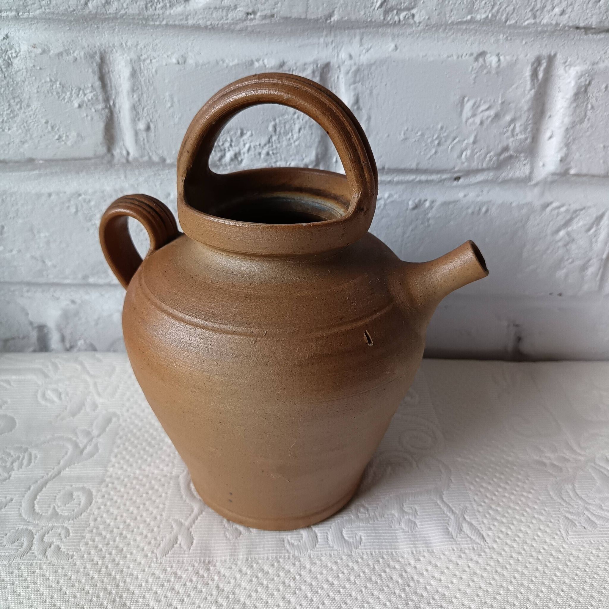 Vintage handmade brown glazed stoneware gargoulette.