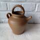 Vintage handmade brown glazed stoneware gargoulette.